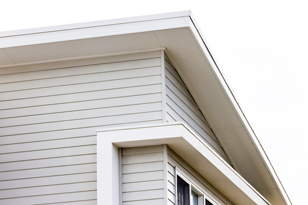 A white house with a roof
AI-generated content may be incorrect.